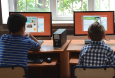 Students working at desktop computers